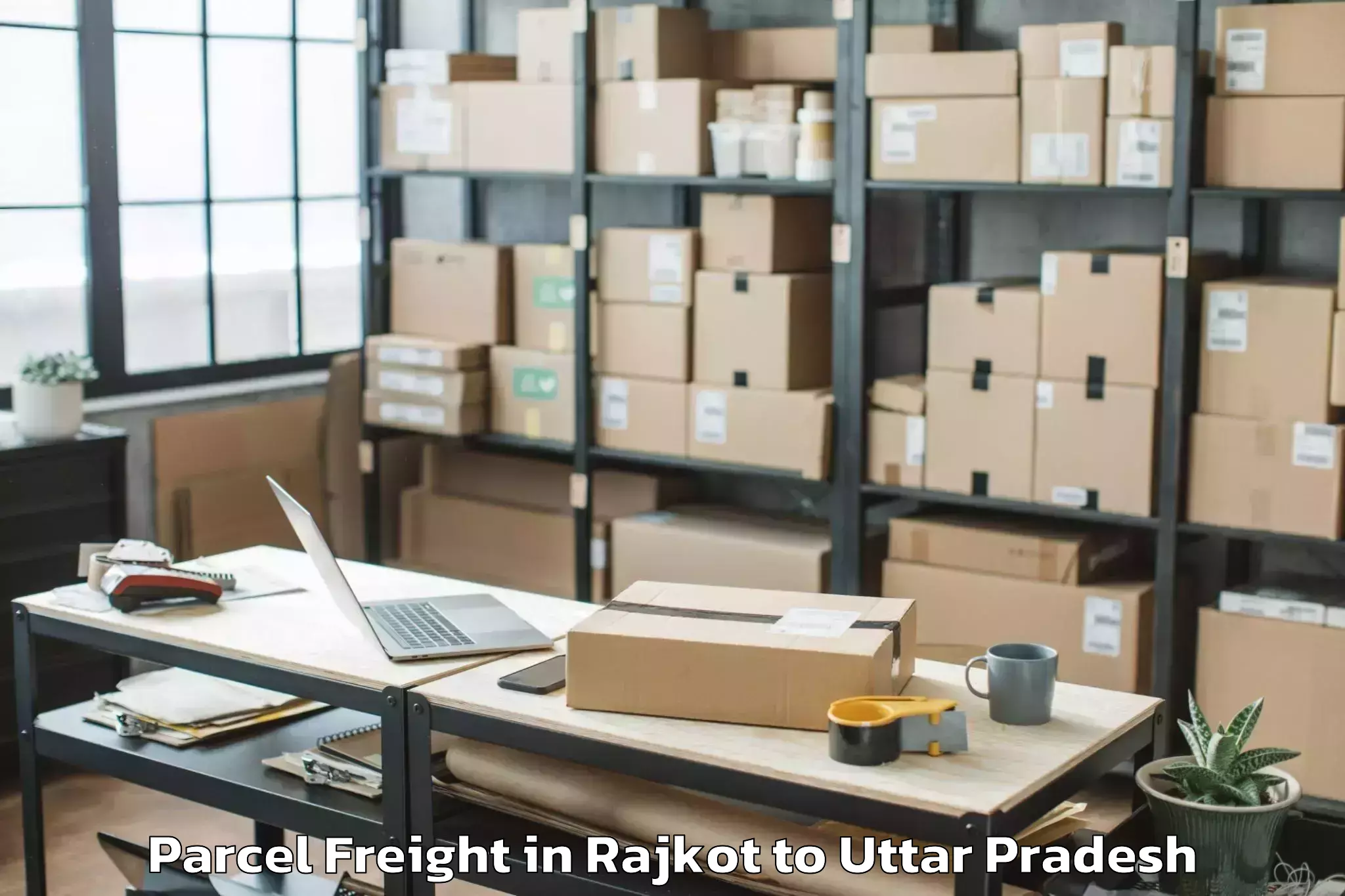 Book Rajkot to Lalitpur Parcel Freight